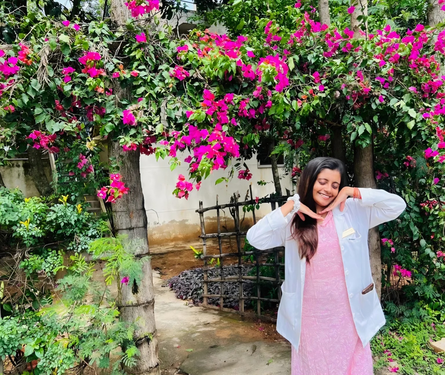 Akansha among flowers